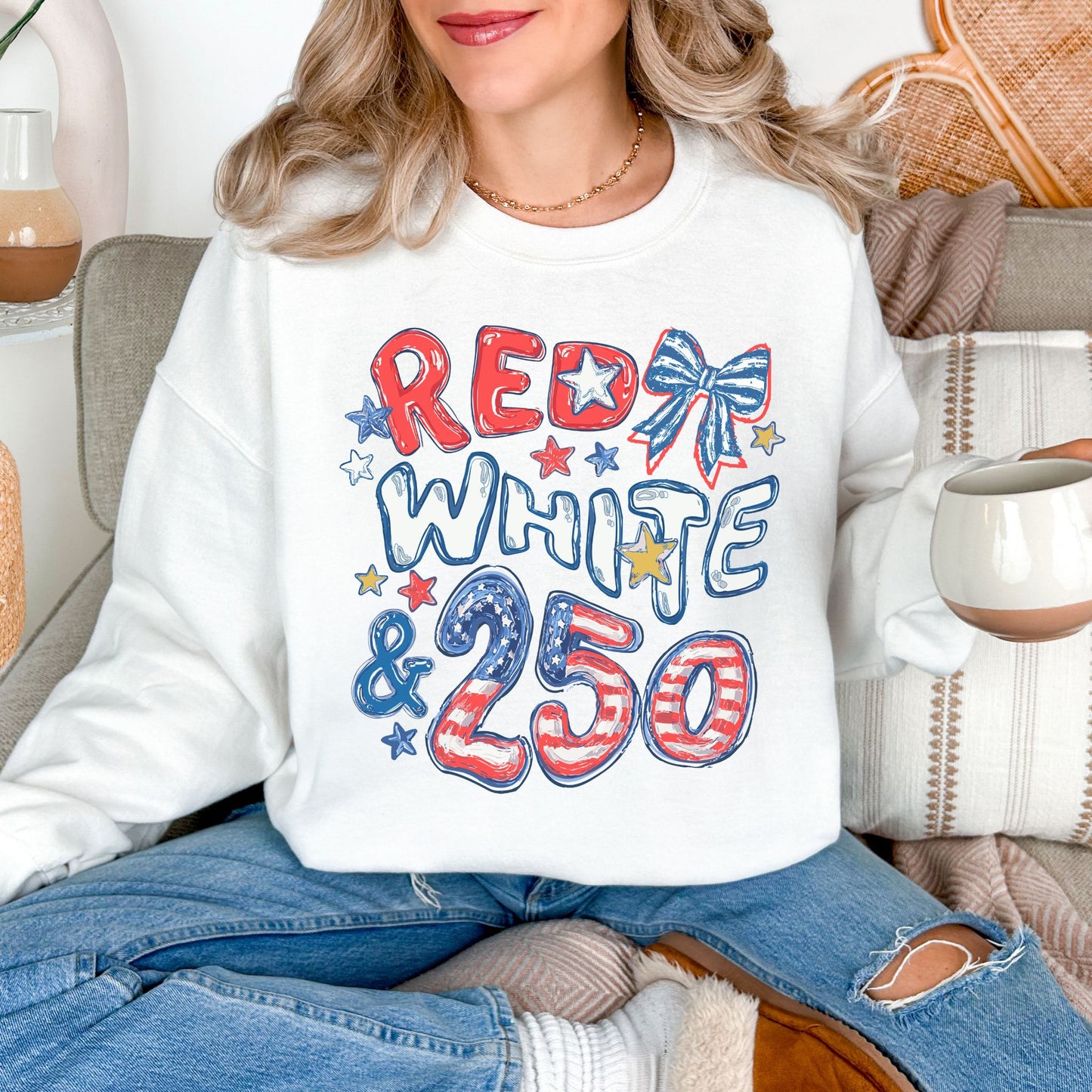 "Red White and 250 Coquette Doodle" on a white Sweatshirt.