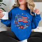 "Faux Rhinestone American Flag Diamond Art" graphic on bright medium blue (royal blue) sweatshirt.