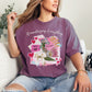 "Romanticizing Everything" graphic on deep berry pink (berry) t-shirt.