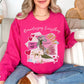 "Romanticizing Everything" graphic on bright pink (heliconia) Sweatshirt.