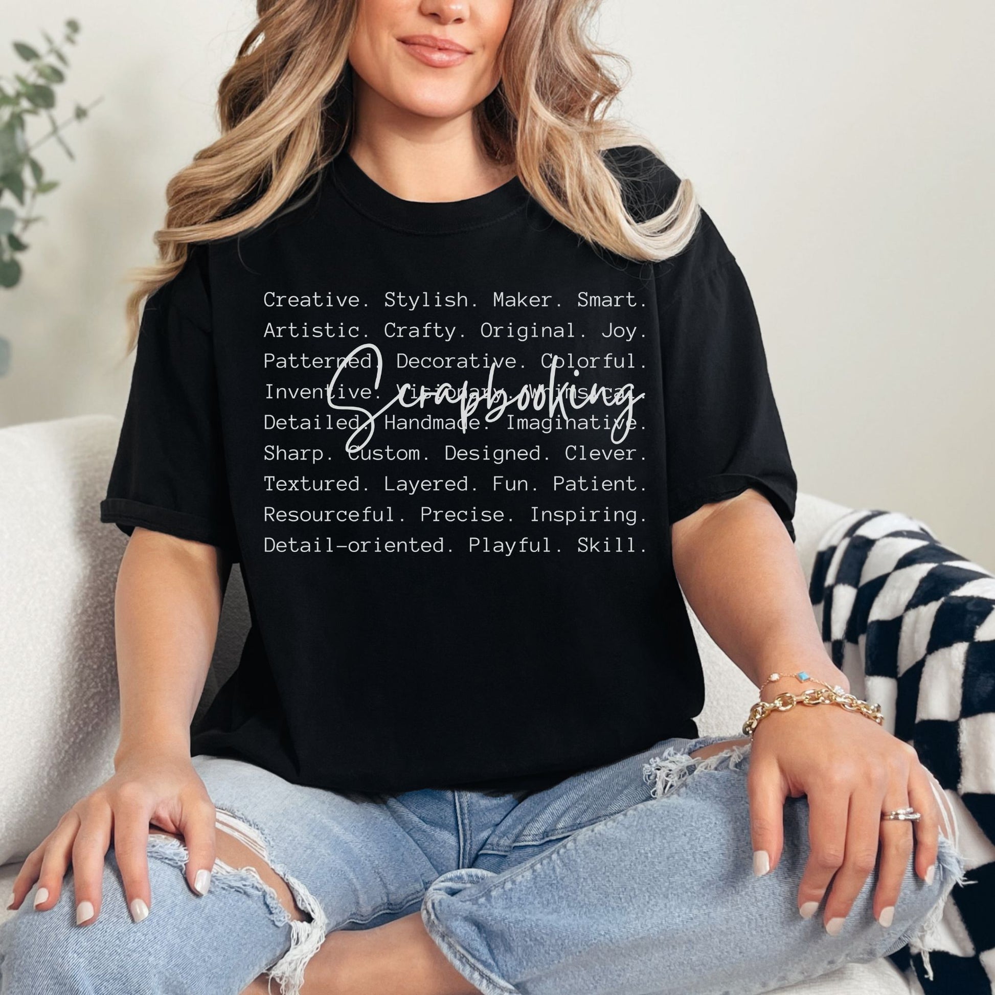 "Scrapbooking Words" graphic on a black t-shirt.