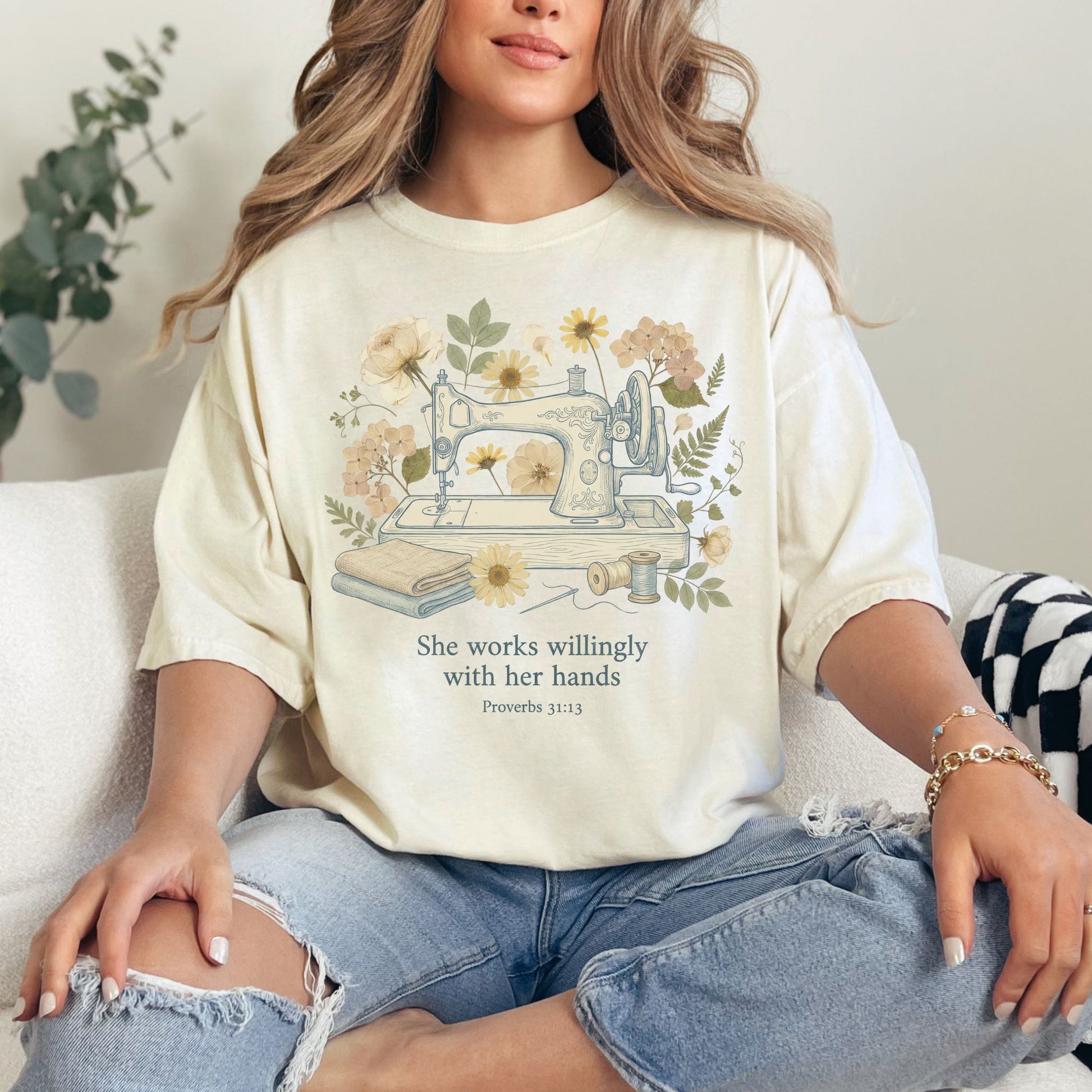 "Sewing She Works Willingly" on soft off-white (ivory) T- Shirt.