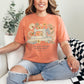 "Sewing She Works Willingly" on warm earthy orange-brown (terracotta) T- Shirt.