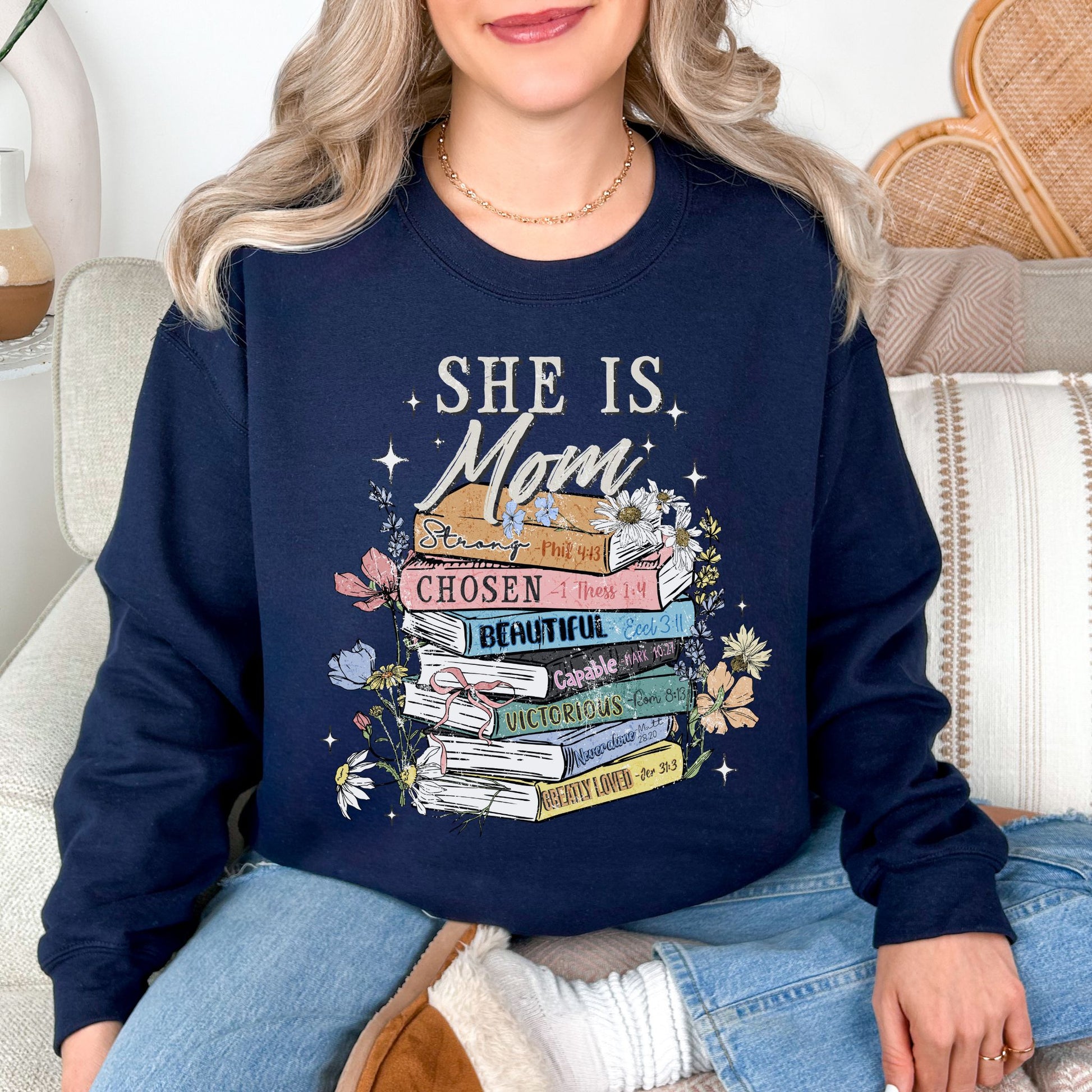"She is mom" graphic on deep navy blue (navy) Sweatshirt.