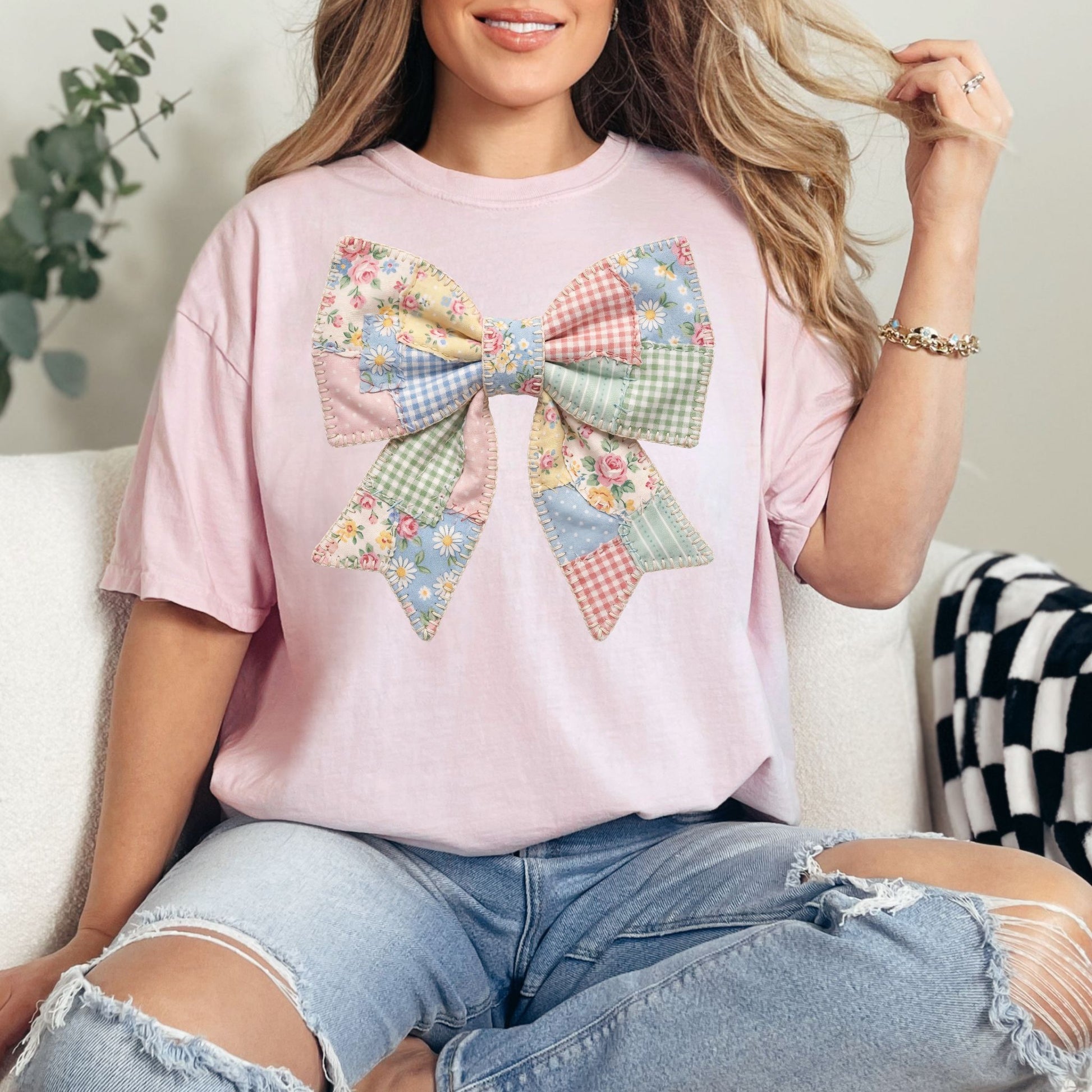 "Spring Faux Patchwork Bow" graphic on soft pink (blossom) T-Shirt.