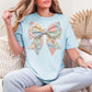 "Spring Faux Patchwork Bow" graphic on soft medium blue (chambray) T-Shirt.