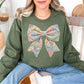 “Spring Faux Patchwork Bow" graphic on muted olive green (military green) sweatshirt.