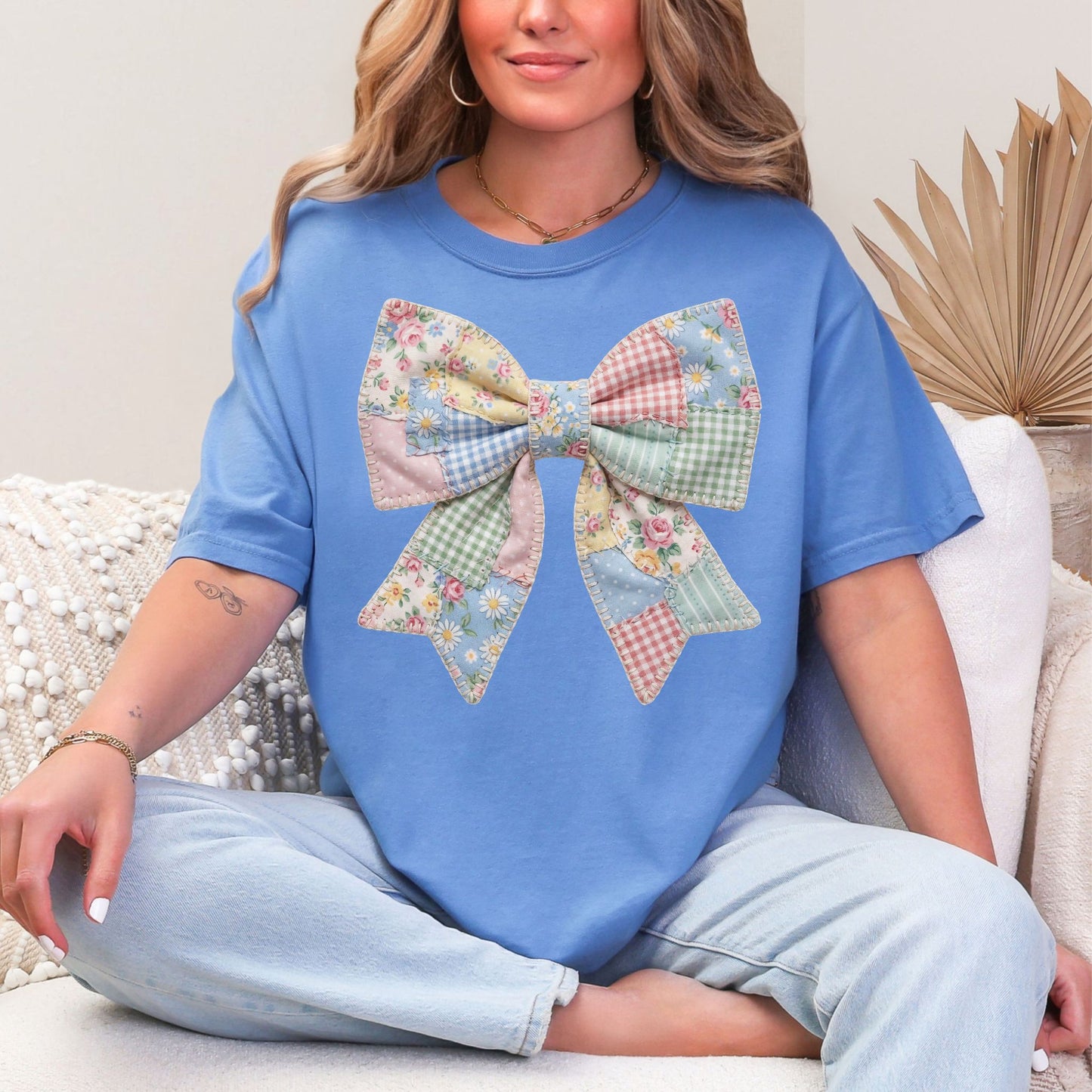 "Spring Faux Patchwork Bow" graphic on muted blue-green (mystic blue) T-Shirt.
