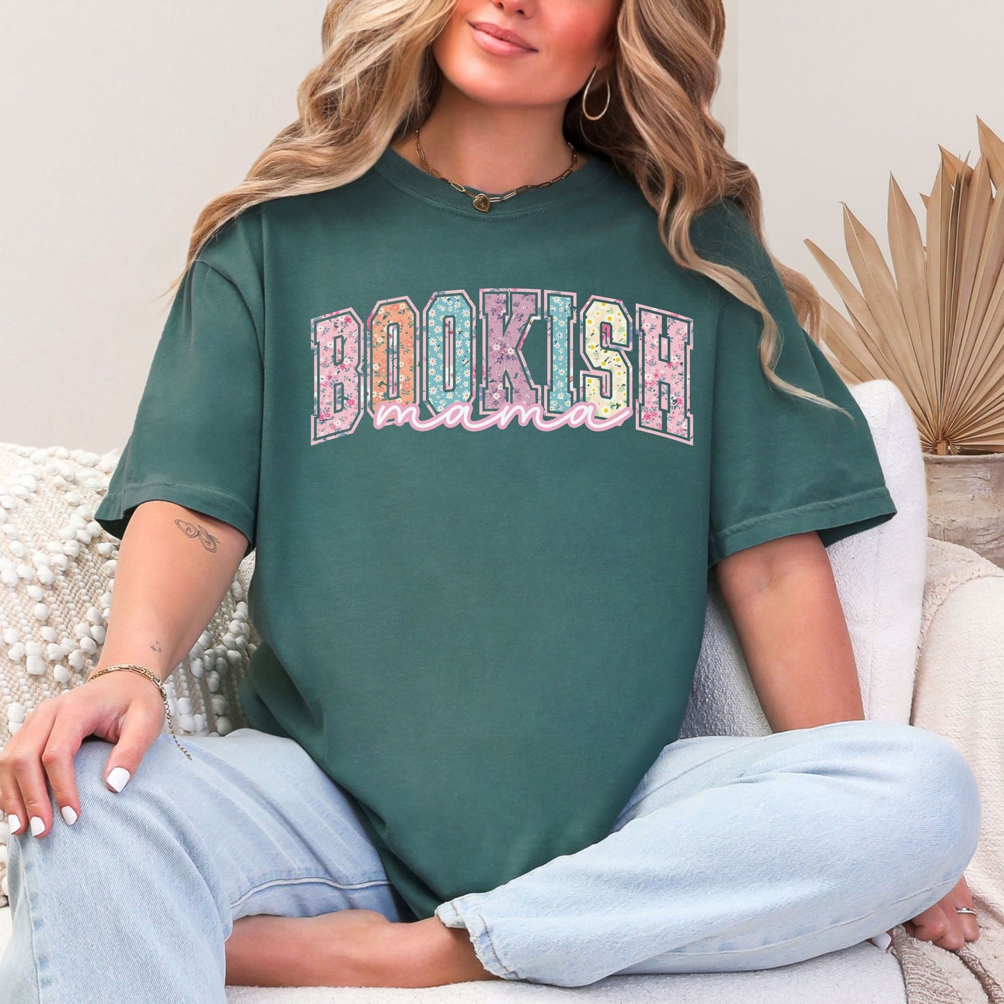 “Spring Floral Bookish Mama" graphic on muted blue-green (blue spruce) t-shirt.