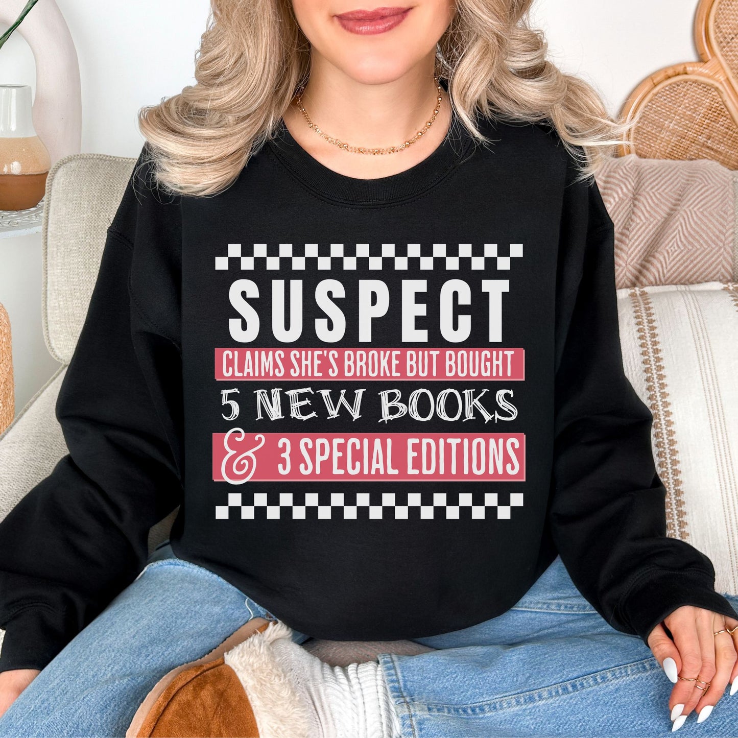 "Suspect Claims She's Broke" graphic on deep black (black) Sweatshirt