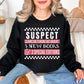 "Suspect Claims She's Broke" graphic on deep black (black) Sweatshirt