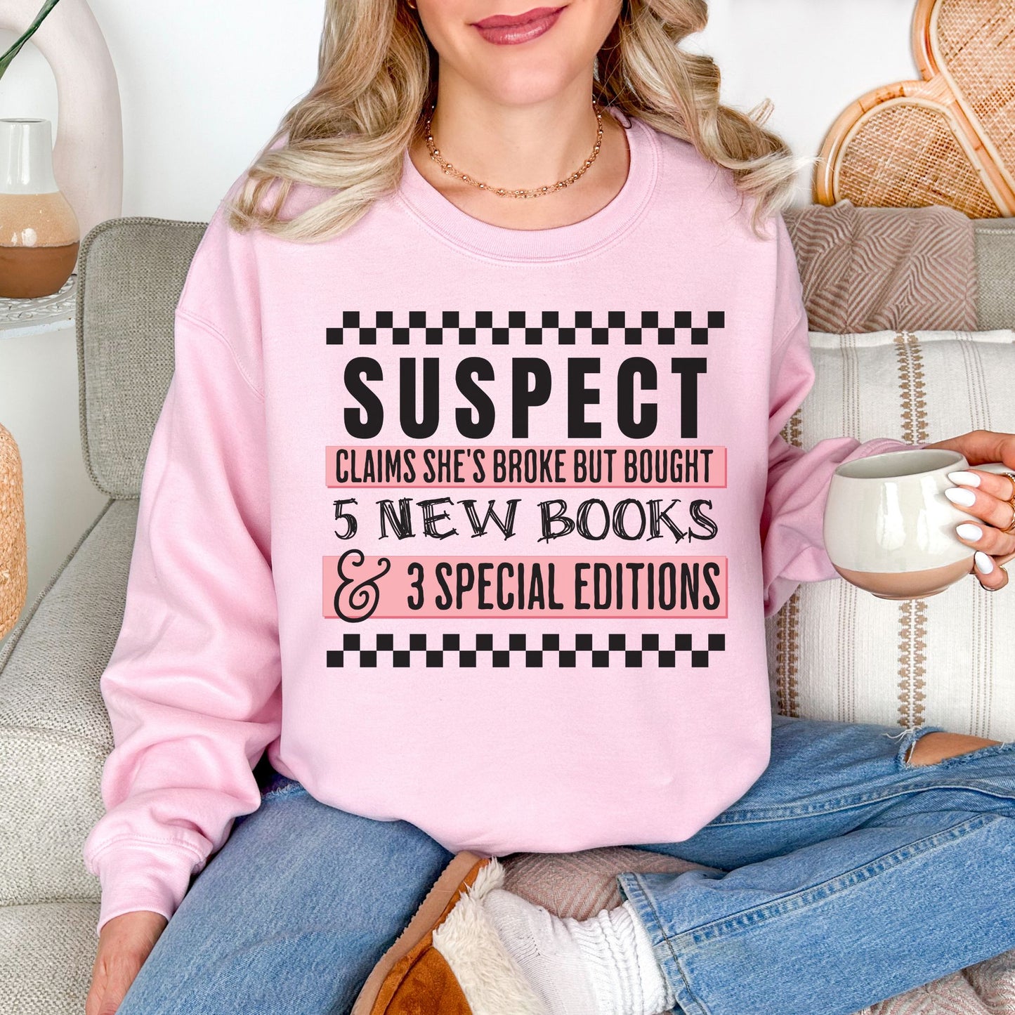 "Suspect Claims She's Broke" graphic on soft pale pink (light pink) Sweatshirt