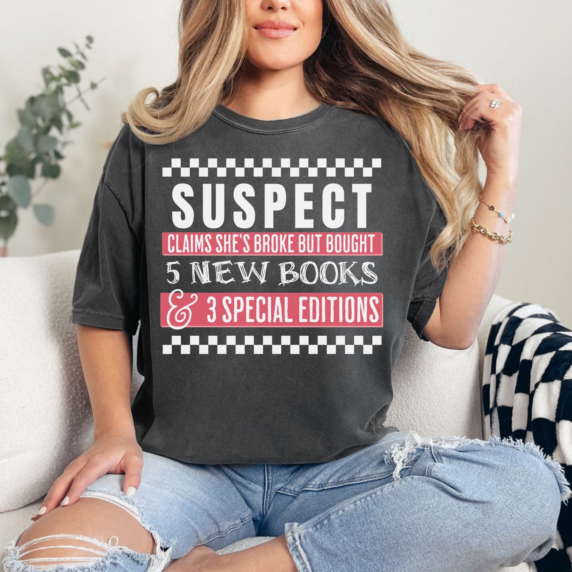 "Suspect Claims she's broke" in dark charcoal gray (pepper)