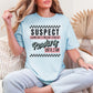 "Suspect Claims she's Tired" in soft medium blue (chambray)