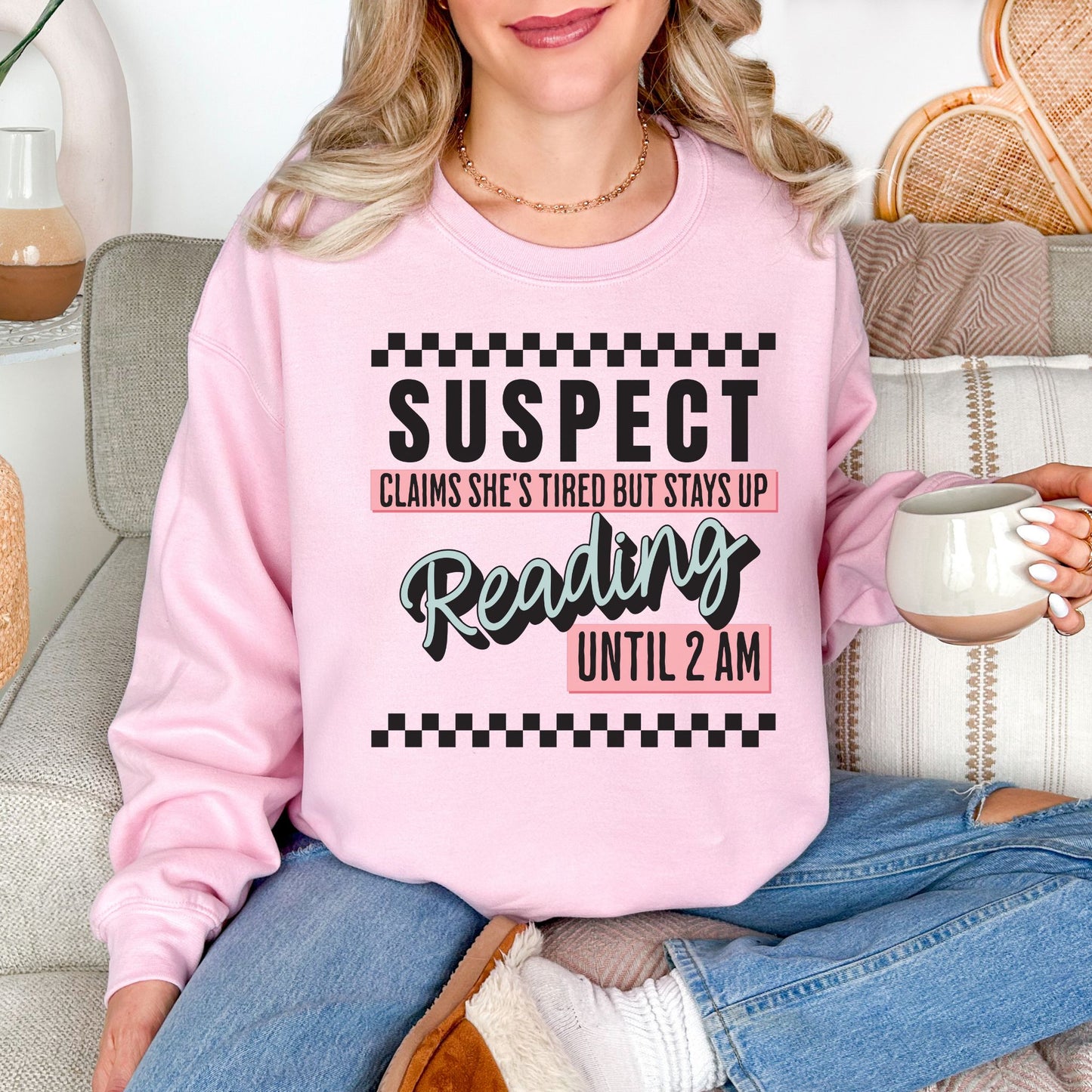 “Suspect claims she's tired" graphic on soft pale pink (light pink) Sweatshirt
