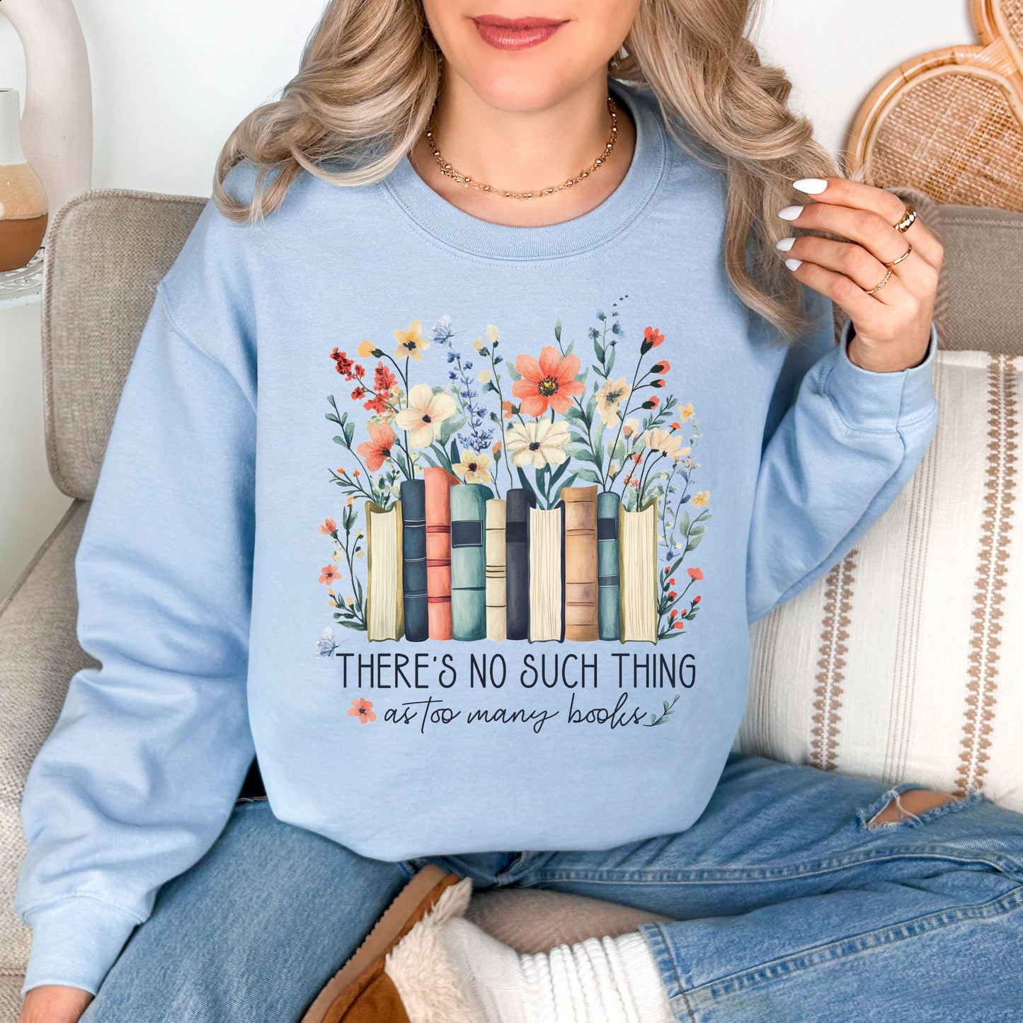 “There's no such thing as too many books" graphic on pale soft blue (light blue) Sweatshirt