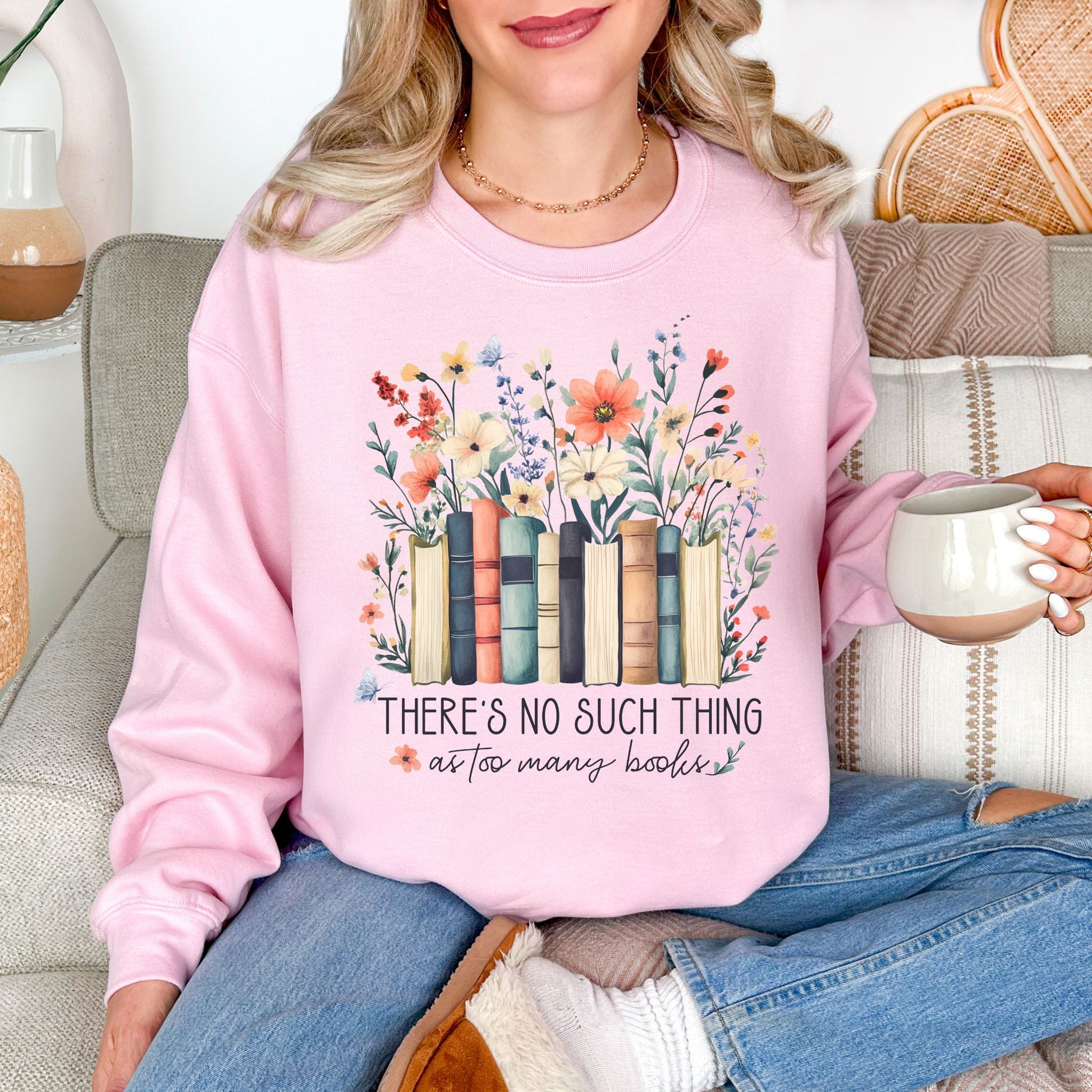 “There's no such thing as too many books" graphic on soft pale pink (light pink) Sweatshirt