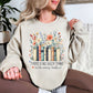 “There's no such thing as too many books" graphic on light warm beige (sand) Sweatshirt