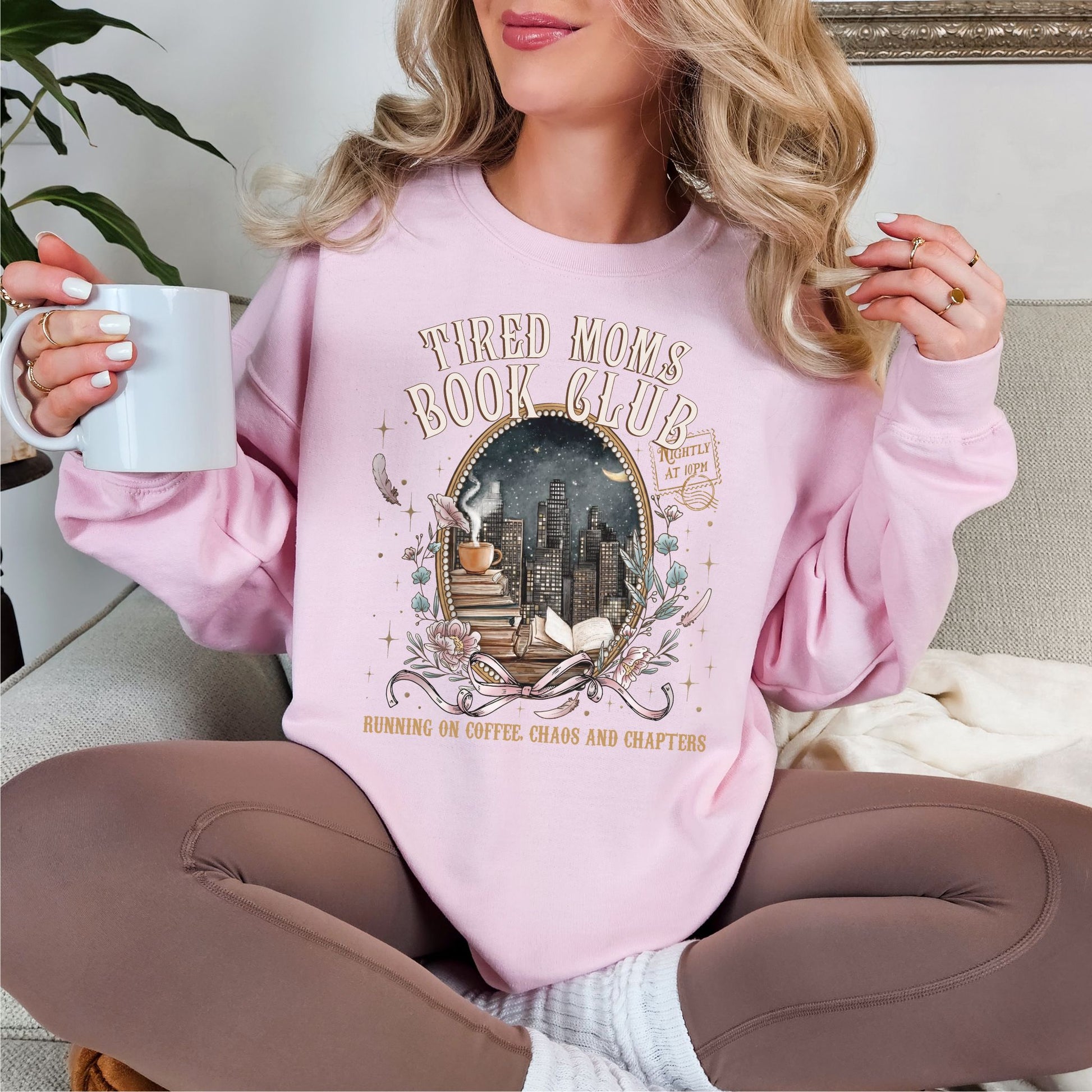 "Tired Moms Book Club" graphic on soft pale pink (light pink) sweatshirt