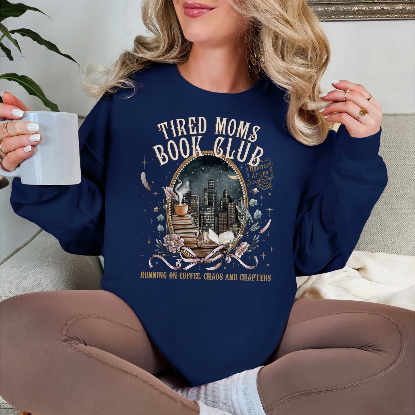 "Tired Moms Book Club" graphic on deep navy blue (navy) sweatshirt