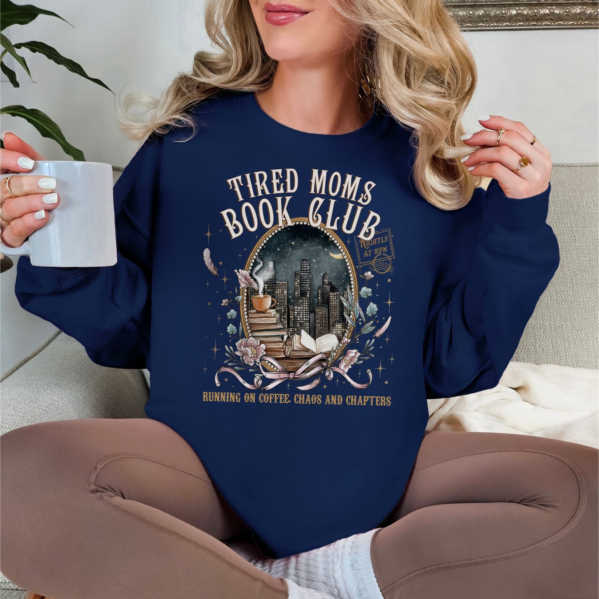 "Tired Moms Book Club" graphic on deep navy blue (navy) sweatshirt